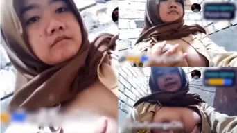 Mey Berhijab Seragam Pramuka Dengan Payudara Montok Menggoda